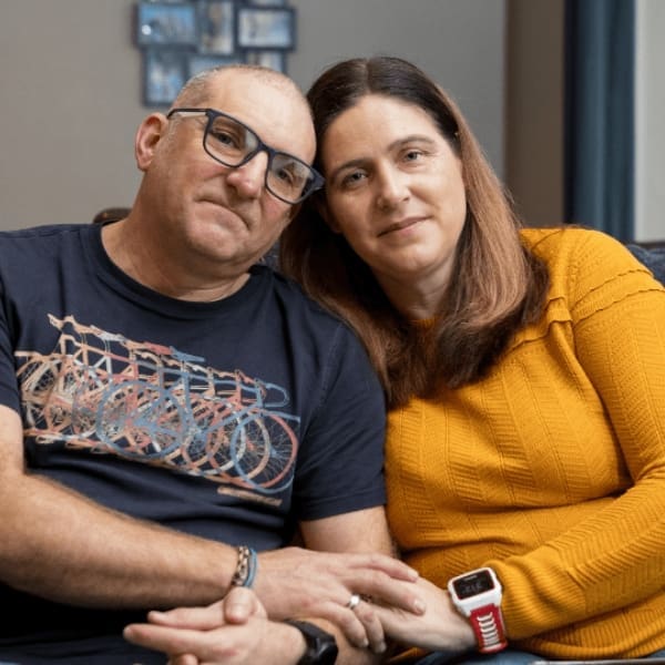 storyteller Andy, with his wife Christine. They are sitting side by side