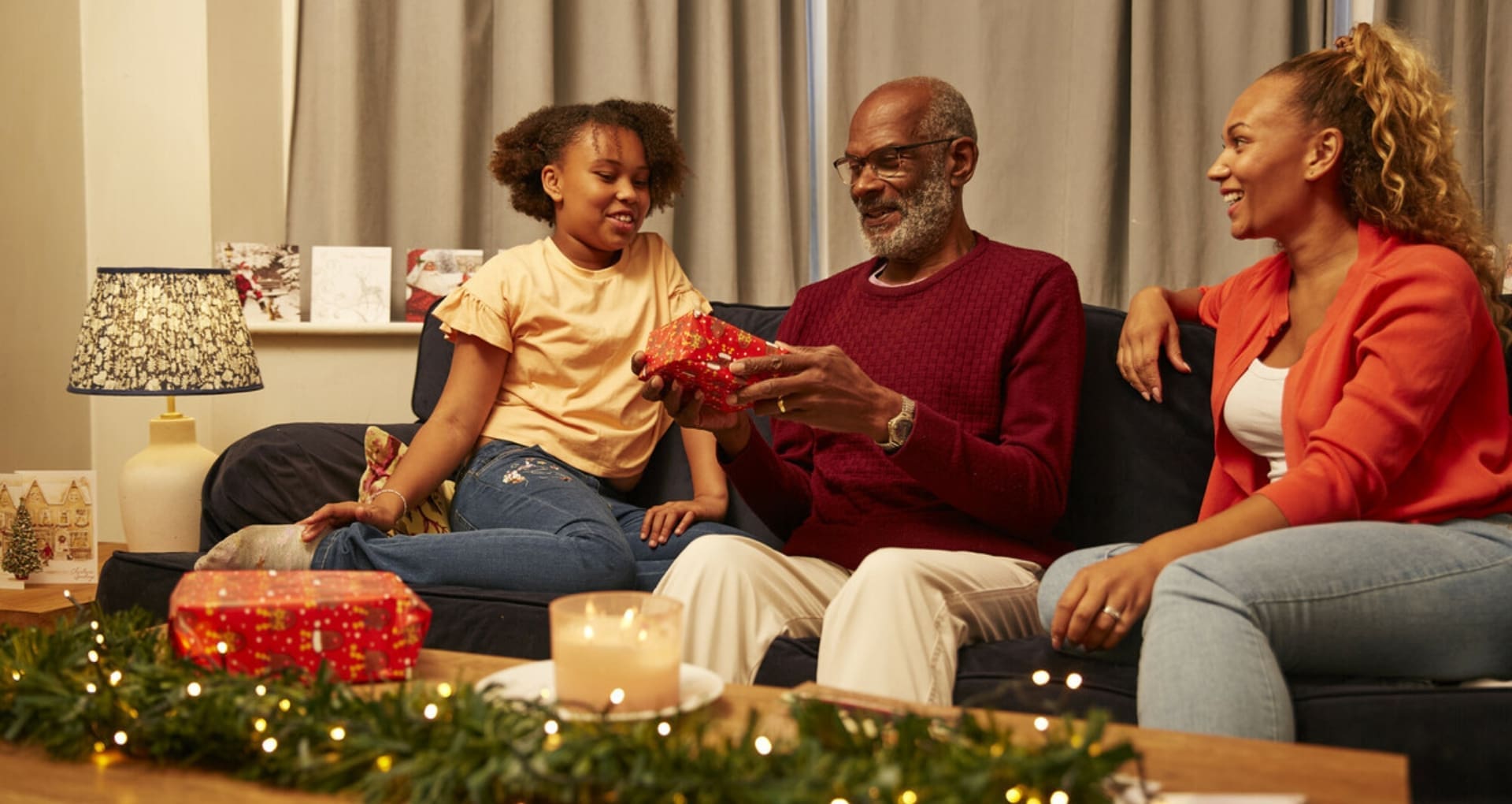 A family at home at Christmas.
