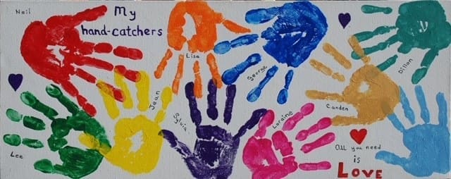Sylvia's painting of hand prints of loved ones - her hand-catchers